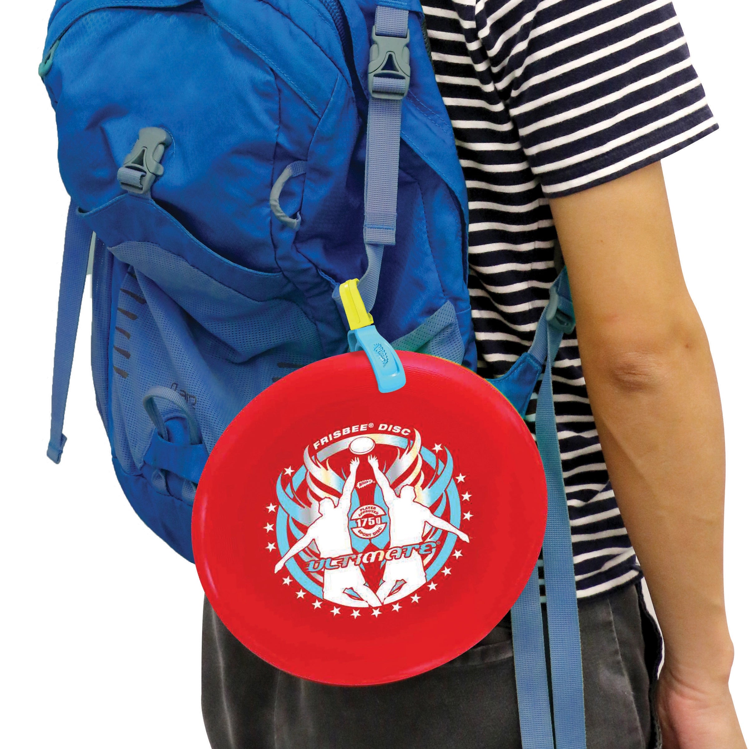 Red Ultimate Frisbee disc attached to blue backpack, person in striped shirt outdoors