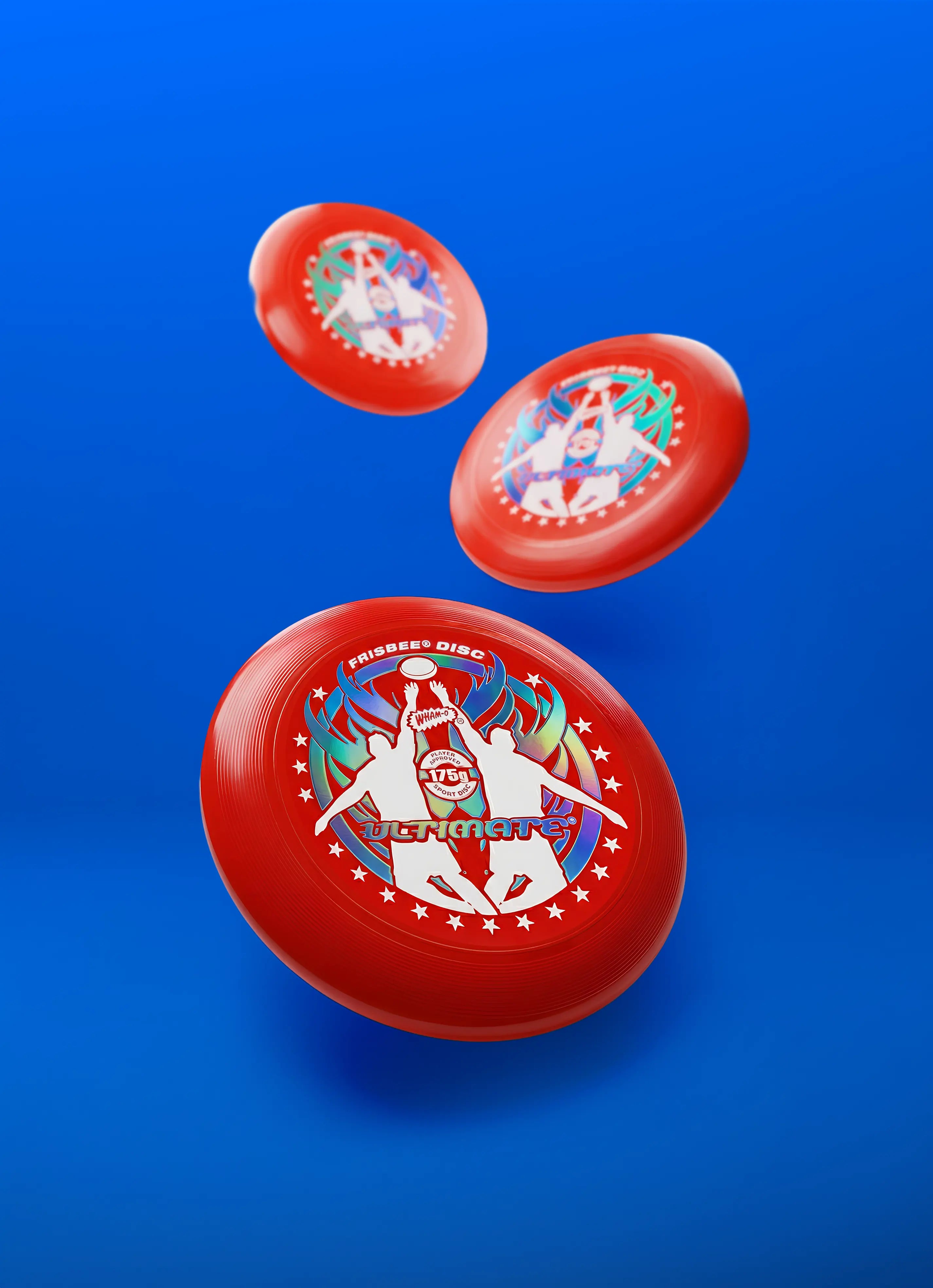 Red Ultimate Frisbee discs with player graphics on blue background, flying in mid-air.