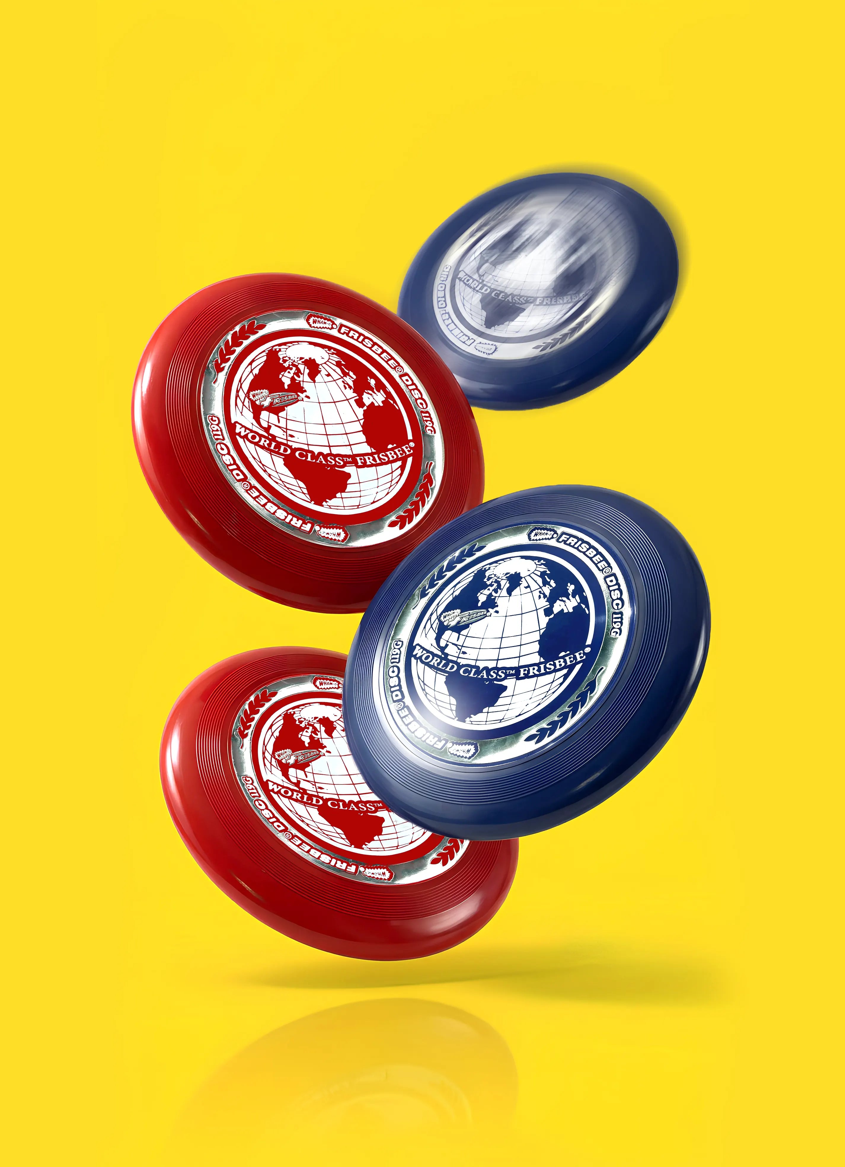Red and blue World Class Frisbee discs floating on a bright yellow background