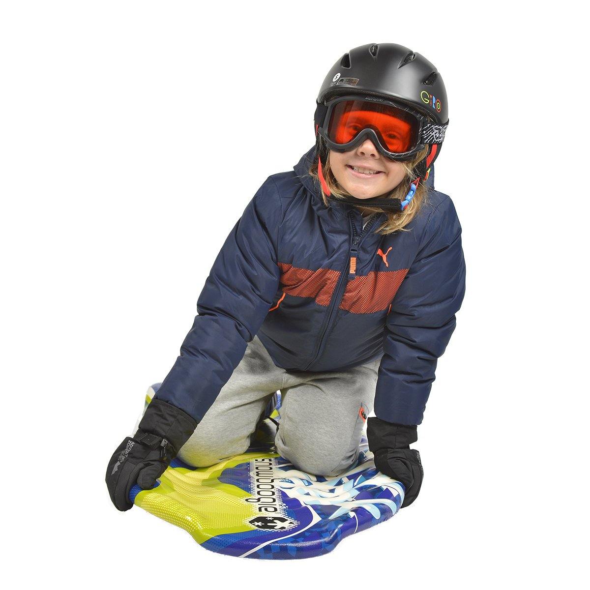 A boy is sitting on the Wham-O Snowboogie® GT 42"