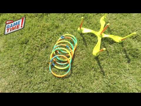 Young kids are playing Game Time! Hula Hoop Ring Toss in the garden