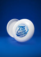 White frisbee with blue 75th anniversary logo on blue background