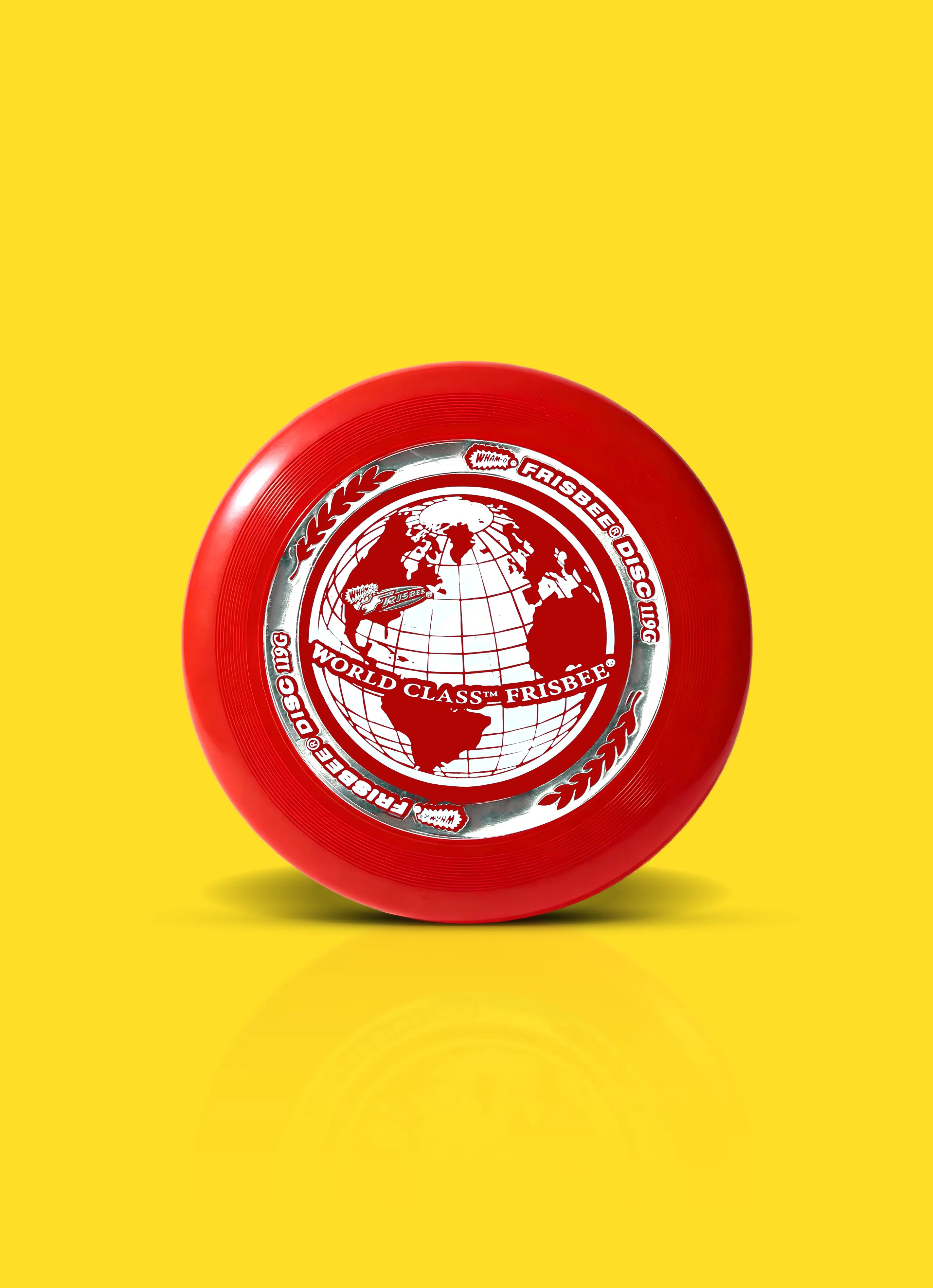 Red World Class Frisbee disc with globe design on yellow background