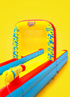 Inflatable Slip 'n Slide with water sprayers, yellow and blue design, on yellow background