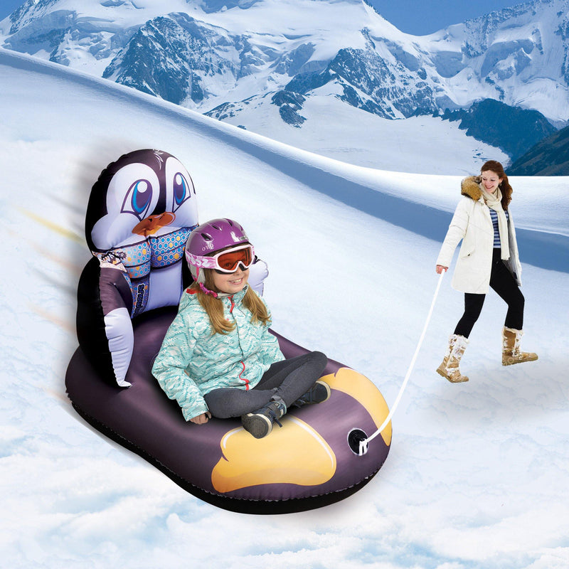 Children are sliding down the hill with Wham-O Snowboogie® Child Inflatable Pull Sled 33"