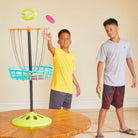 Two children are playing with Wham-O Frisbee® Mini Golf Set indoor shooting