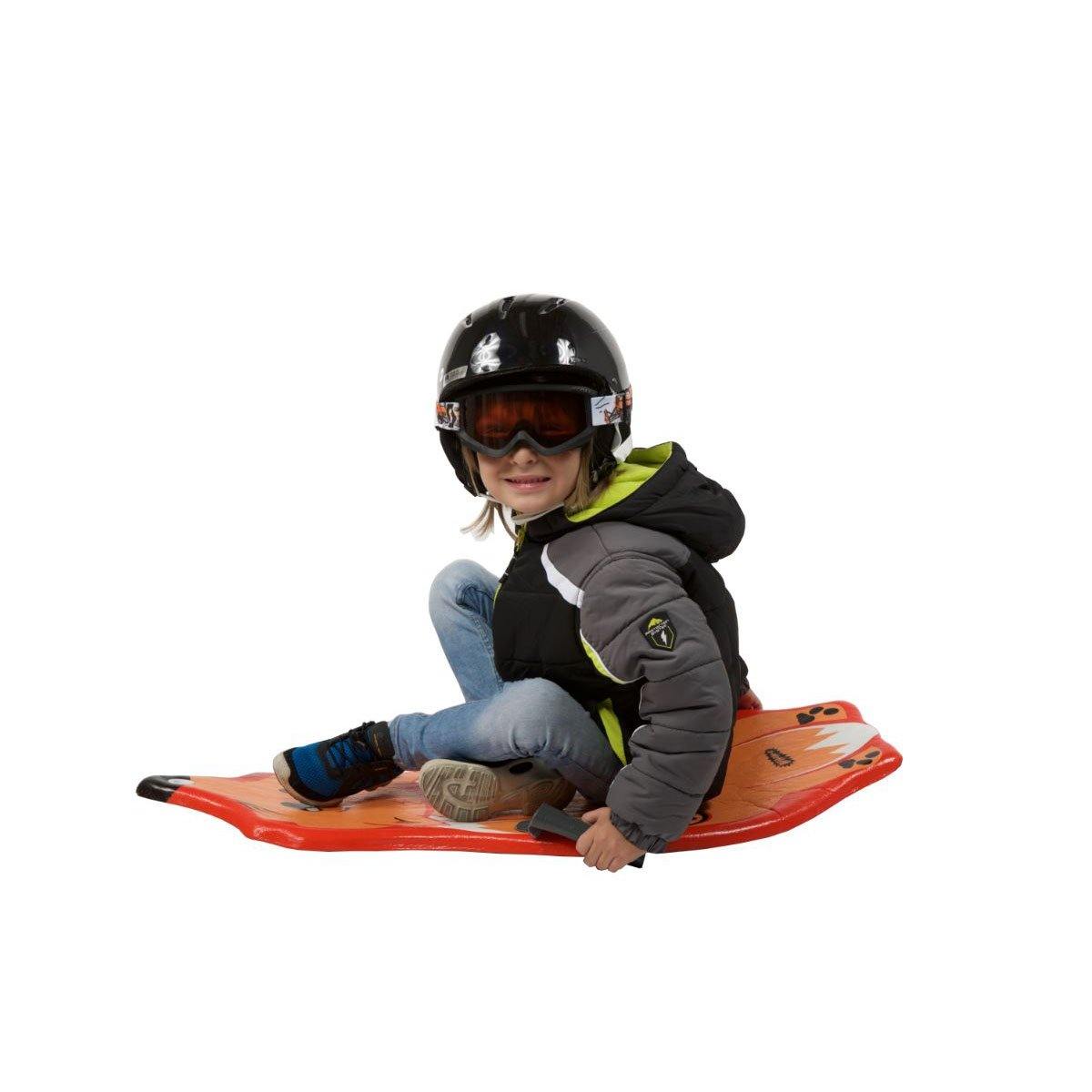 A boy sliding with Wham-O Snowboogie® Animal Sled 36"